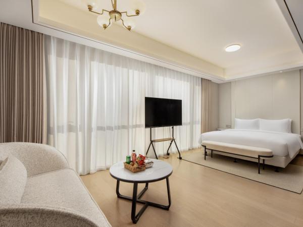 苏州山塘街华贸姑苏里服务公寓 : photo 3 de la chambre chambre double supérieure