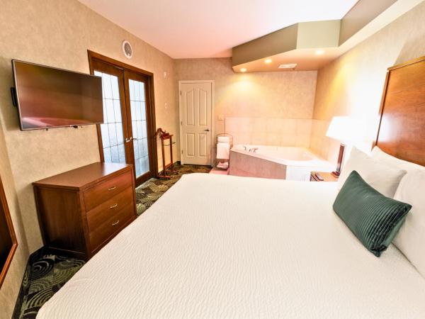 Deerfoot Inn and Casino : photo 1 de la chambre suite affaires avec baignoire de spa