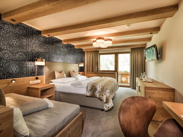 Hotel Post Sport- und Wellness : photo 1 de la chambre chambre triple supérieure