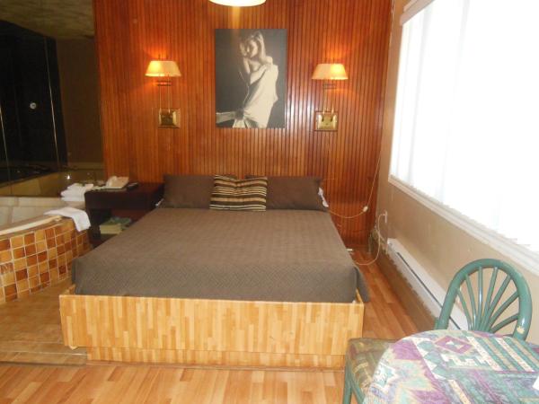 Motel Le Paysan : photo 2 de la chambre suite deluxe avec baignoire spa