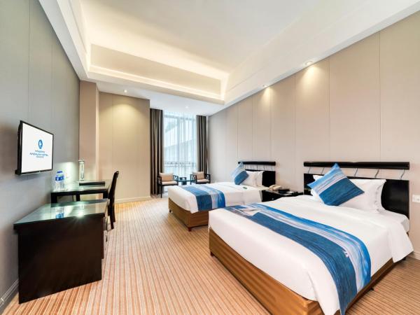 海外海纳川酒店拱墅万达广场渡驾桥地铁站店 : photo 3 de la chambre chambre standard