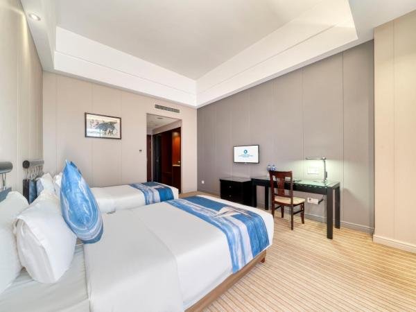 海外海纳川酒店拱墅万达广场渡驾桥地铁站店 : photo 4 de la chambre chambre standard