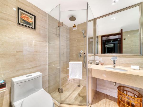 海外海纳川酒店拱墅万达广场渡驾桥地铁站店 : photo 2 de la chambre chambre lits jumeaux deluxe