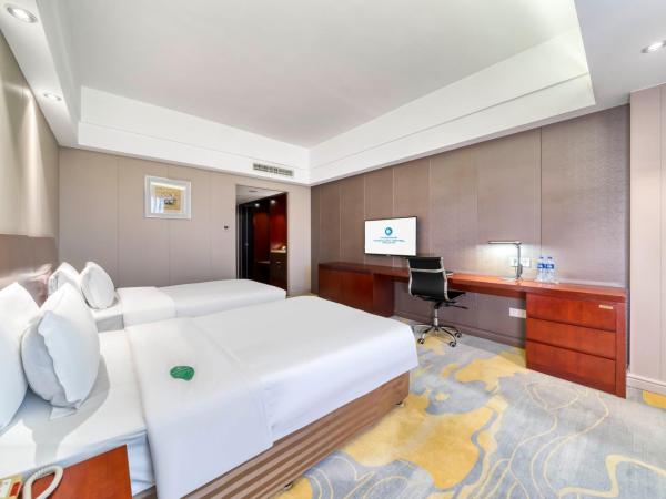 海外海纳川酒店拱墅万达广场渡驾桥地铁站店 : photo 5 de la chambre chambre lits jumeaux deluxe