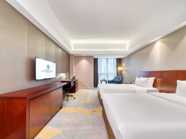 海外海纳川酒店拱墅万达广场渡驾桥地铁站店 : photo 7 de la chambre chambre lits jumeaux deluxe