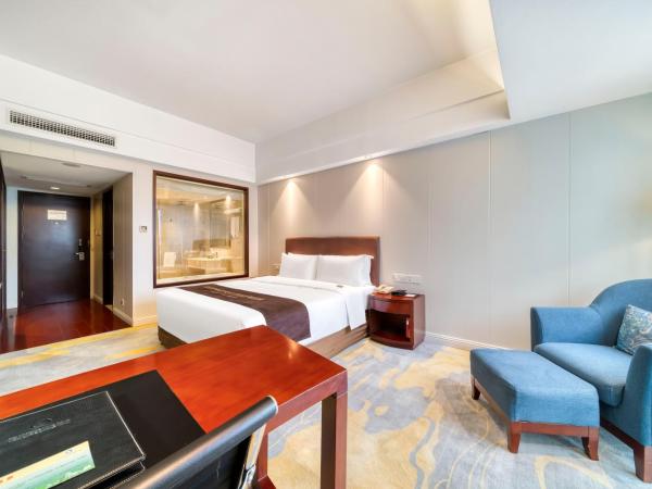 海外海纳川酒店拱墅万达广场渡驾桥地铁站店 : photo 2 de la chambre chambre affaires lit queen-size