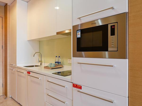 Snug Gaokong Jiangjing Hotel : photo 9 de la chambre chambre lits jumeaux deluxe