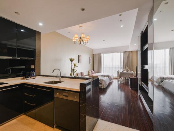 Snug Gaokong Jiangjing Hotel : photo 2 de la chambre suite 2 chambres