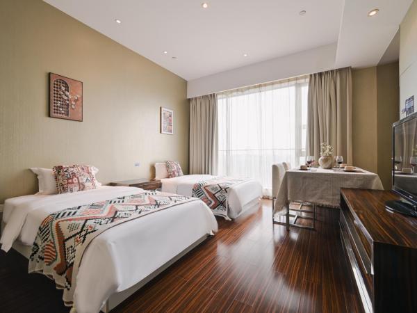 Snug Gaokong Jiangjing Hotel : photo 8 de la chambre suite 2 chambres