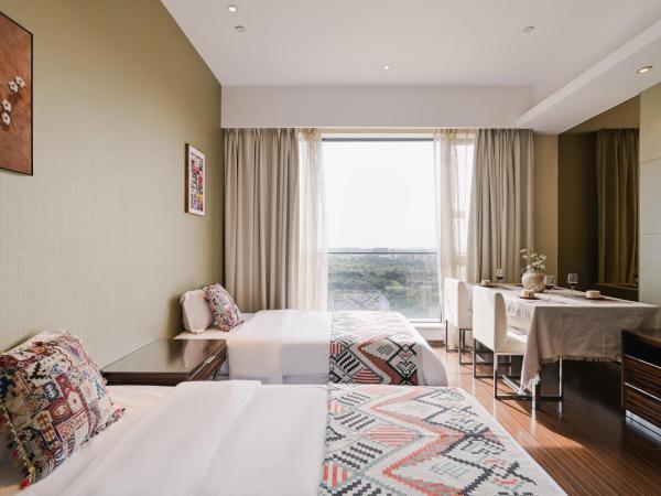 Snug Gaokong Jiangjing Hotel : photo 10 de la chambre suite 2 chambres