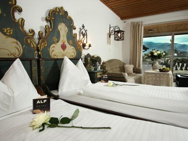 Alp Art Hotel Götzens : photo 1 de la chambre chambre quadruple