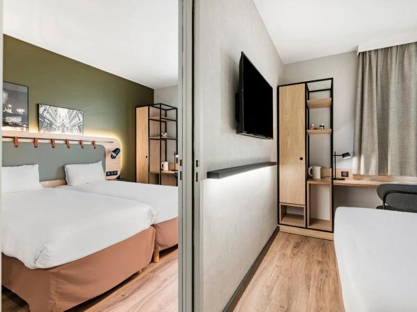 Campanile Lyon Centre Part-Dieu : photo 7 de la chambre chambre quadruple avec 1 lit double et 2 lits simples