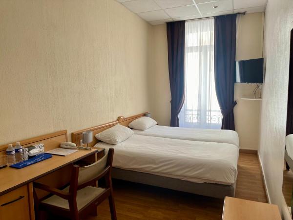 Le Beau Séjour : photo 3 de la chambre chambre double ou lits jumeaux standard - côté ville