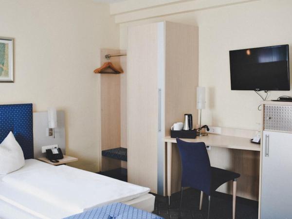 Hotel Löwen-Seckenheim : photo 1 de la chambre chambre simple avec salle de bains