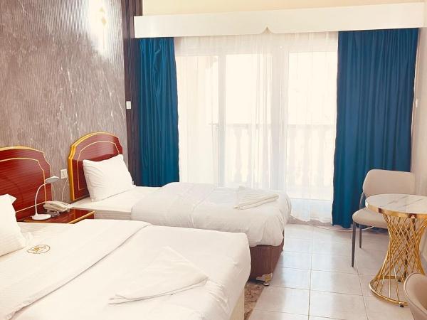 Galaxy Star Hotel : photo 1 de la chambre chambre double deluxe (2 adultes + 1 enfant)