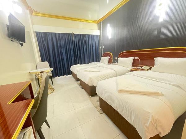 Galaxy Star Hotel : photo 3 de la chambre chambre triple deluxe