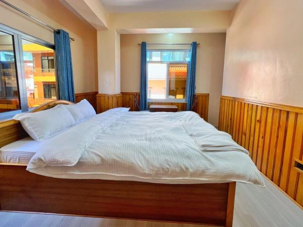 Sanjie Bhumi Guest House : photo 3 de la chambre chambre double