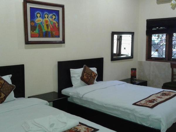 Alam Jogja Resort Mitra RedDoorz : photo 6 de la chambre chambre lits jumeaux