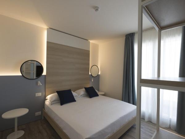 Hotel Baia : photo 2 de la chambre chambre triple deluxe