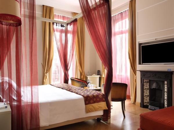 Château Monfort - Relais & Châteaux : photo 4 de la chambre chambre triple deluxe