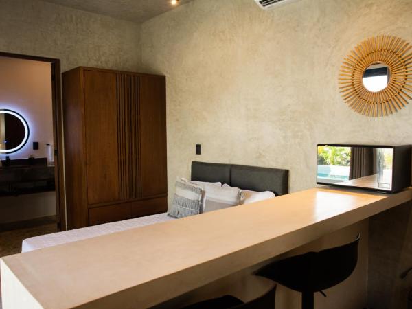 Estudios Lool Village Tulum : photo 3 de la chambre chambre double - vue sur piscine