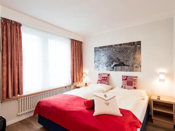 Le Petit CHARME-INN : photo 7 de la chambre chambre lits jumeaux