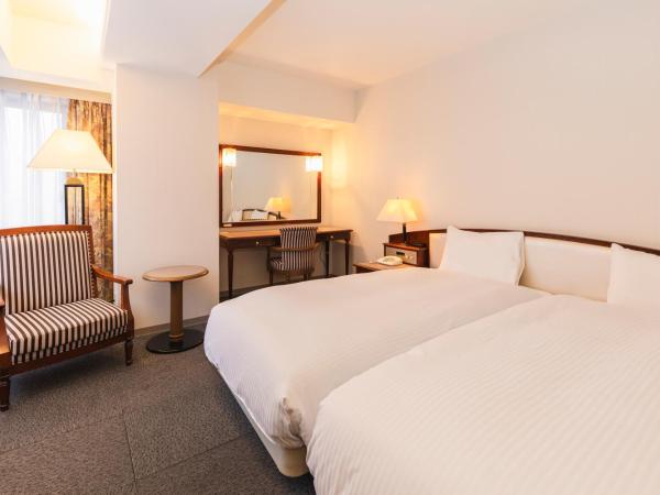 Hotel Sunroute Niigata : photo 1 de la chambre chambre lits jumeaux supérieure - non-fumeurs