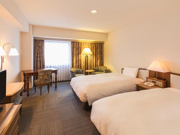 Hotel Sunroute Niigata : photo 2 de la chambre chambre lits jumeaux de luxe - fumeurs