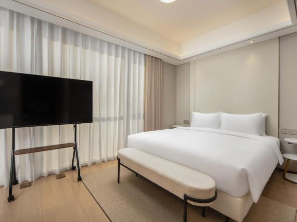 苏州山塘街华贸姑苏里服务公寓 : photo 2 de la chambre chambre double supérieure