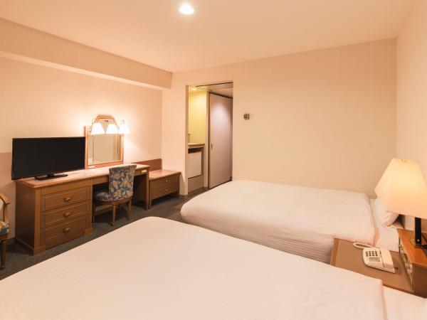 Hotel Sunroute Niigata : photo 2 de la chambre chambre lits jumeaux standard - fumeurs