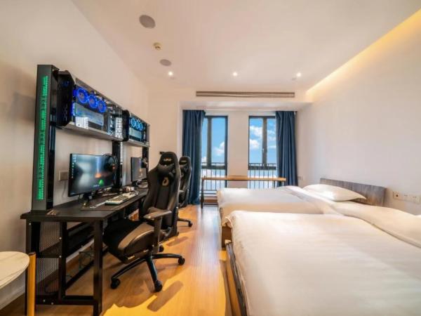 Muyu E-SPORT HOTEL慕鱼电竞酒店 : photo 1 de la chambre chambre lits jumeaux avec salle de bains privative