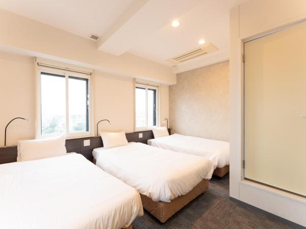 Tabist TOKYO CITY VIEW HOTEL : photo 2 de la chambre chambre triple - vue sur ville