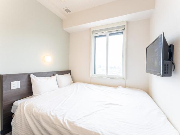 Tabist TOKYO CITY VIEW HOTEL : photo 1 de la chambre chambre double deluxe - vue sur ville