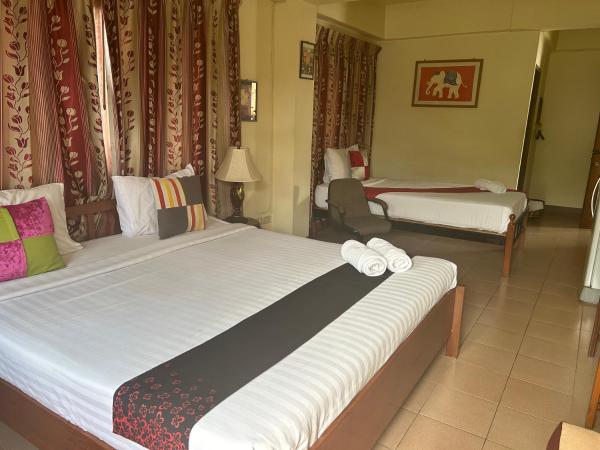 Saithong House : photo 1 de la chambre chambre triple avec balcon
