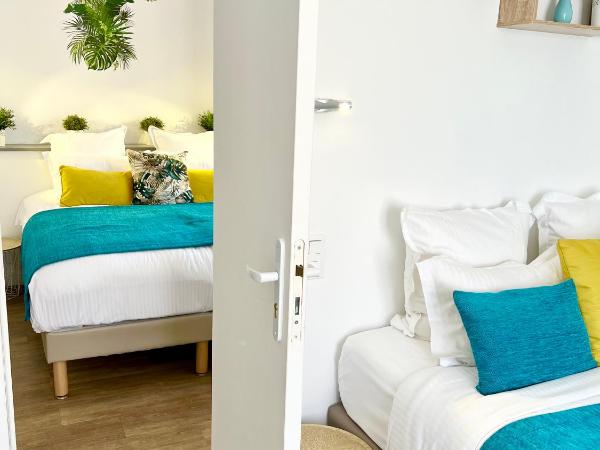 Hotel L'Escapade : photo 9 de la chambre chambre familiale