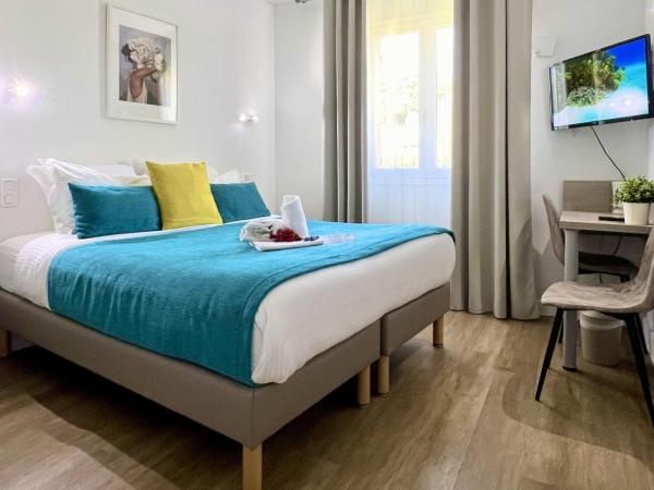 Hotel L'Escapade : photo 1 de la chambre chambre lit king-size standard