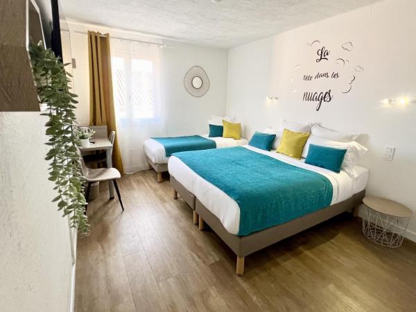 Hotel L'Escapade : photo 1 de la chambre chambre triple