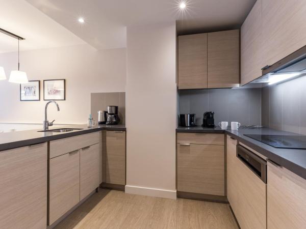 Résidence Pierre & Vacances Premium Presqu'Ile de la Touques : photo 3 de la chambre appartement 1 chambre - côté rue (4 personnes) - bâtiments de la capitainerie