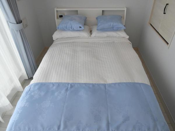 CRYSTAL & RESORT FUKUOKA : photo 4 de la chambre chambre double Économique avec petit lit double