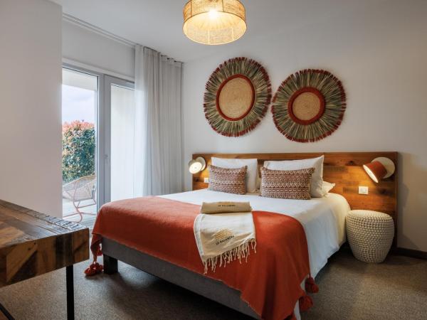 Le Balamina : photo 3 de la chambre suite familiale (2 lits doubles)