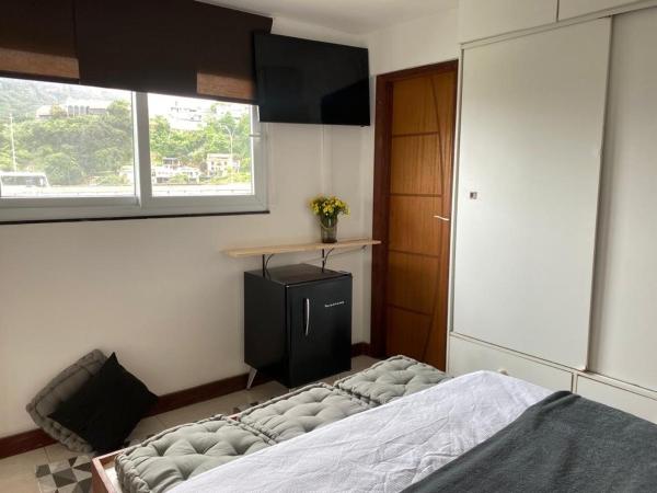 Laguna Hostel : photo 3 de la chambre chambre lit queen-size - vue sur mer