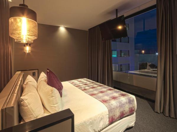 Kharma Suites : photo 1 de la chambre chambre lit king-size deluxe