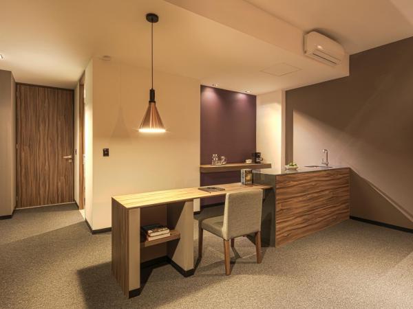 Kharma Suites : photo 3 de la chambre chambre lit king-size deluxe