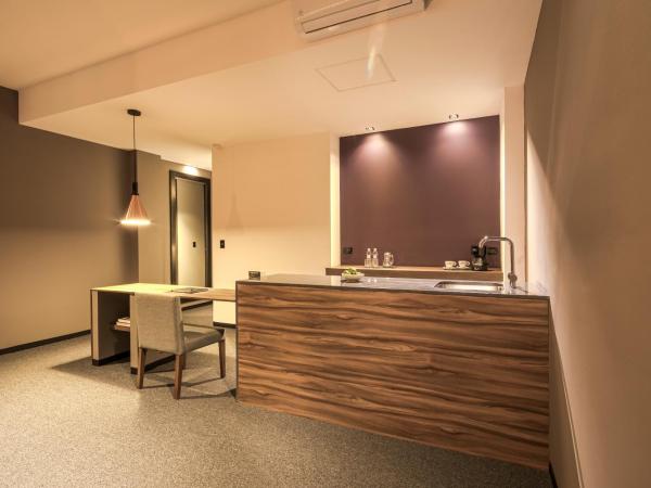 Kharma Suites : photo 6 de la chambre chambre lit king-size deluxe