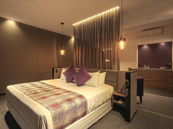 Kharma Suites : photo 8 de la chambre chambre lit king-size deluxe