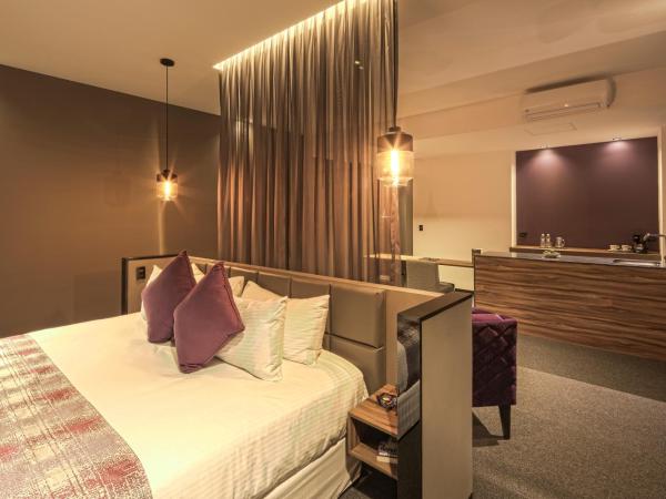 Kharma Suites : photo 9 de la chambre chambre lit king-size deluxe