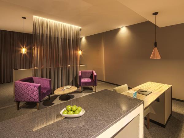 Kharma Suites : photo 10 de la chambre chambre lit king-size deluxe