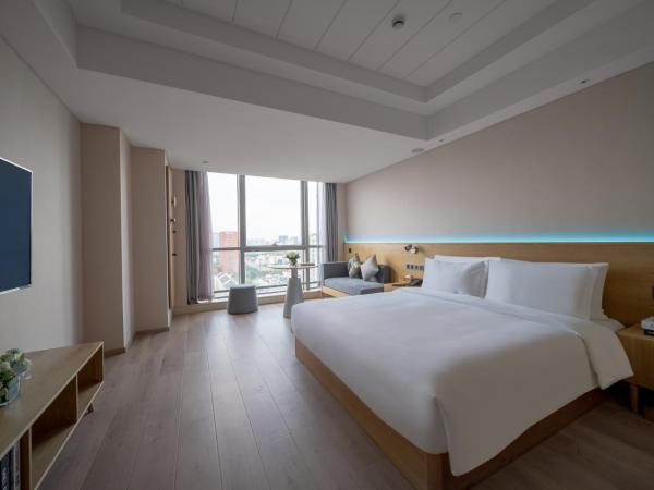 Westlake Art Hotel -Xiasha University Town Branch : photo 1 de la chambre chambre lit queen-size deluxe