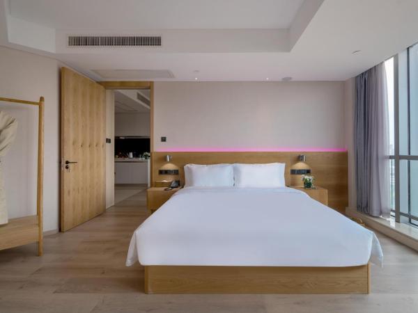 Westlake Art Hotel -Xiasha University Town Branch : photo 4 de la chambre chambre lit queen-size deluxe