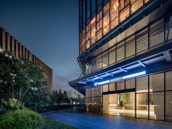 Westlake Art Hotel -Xiasha University Town Branch : photo 5 de la chambre chambre lit queen-size deluxe